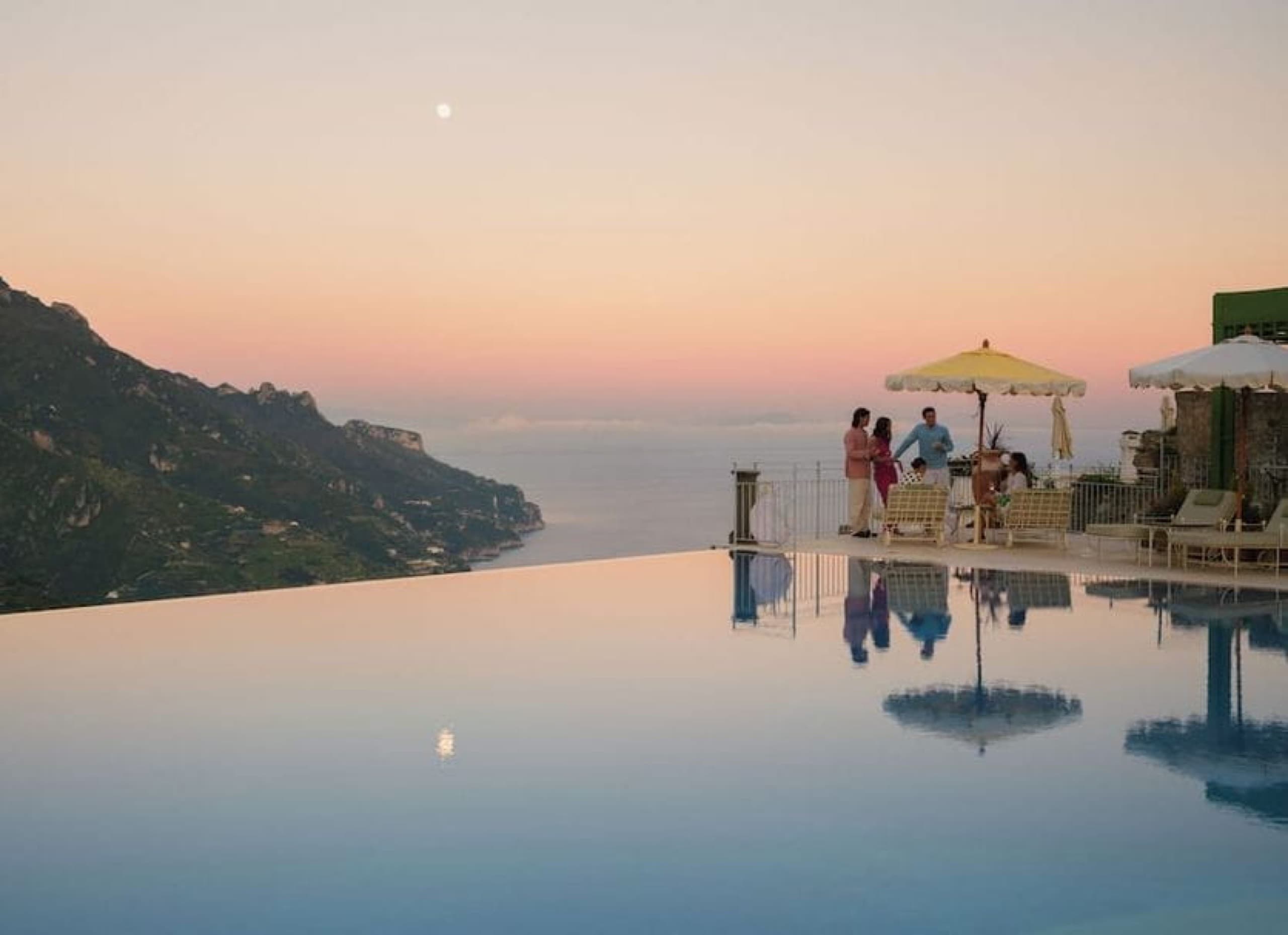 Sunset infinity pool overlooking the sea at Belmond Hotel Caruso, a luxury hotel on Italy's Amalfi Coast