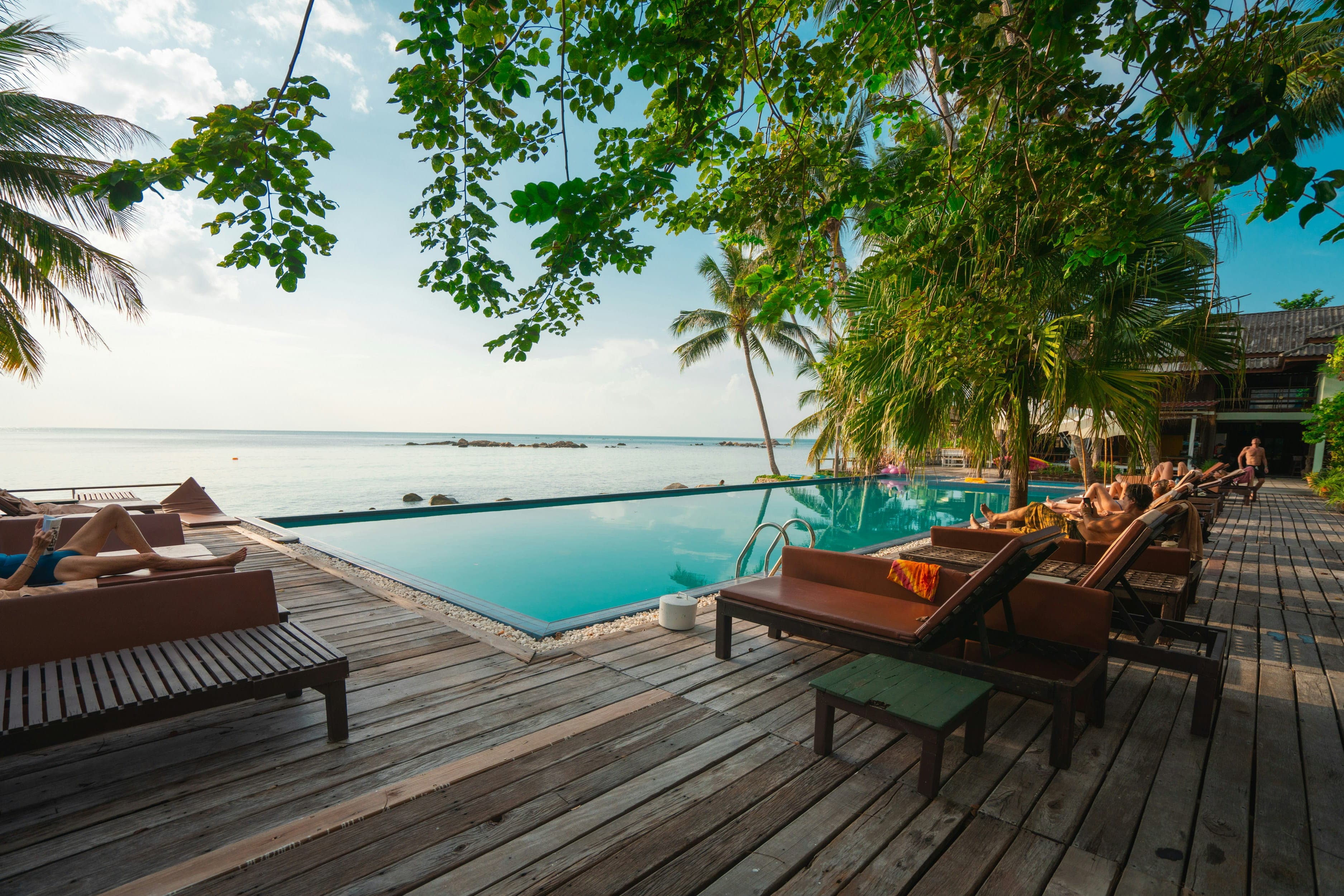 Luxury hotel exterior at twilight — join The Approved List